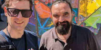 Thomas and Richard smiling to camera