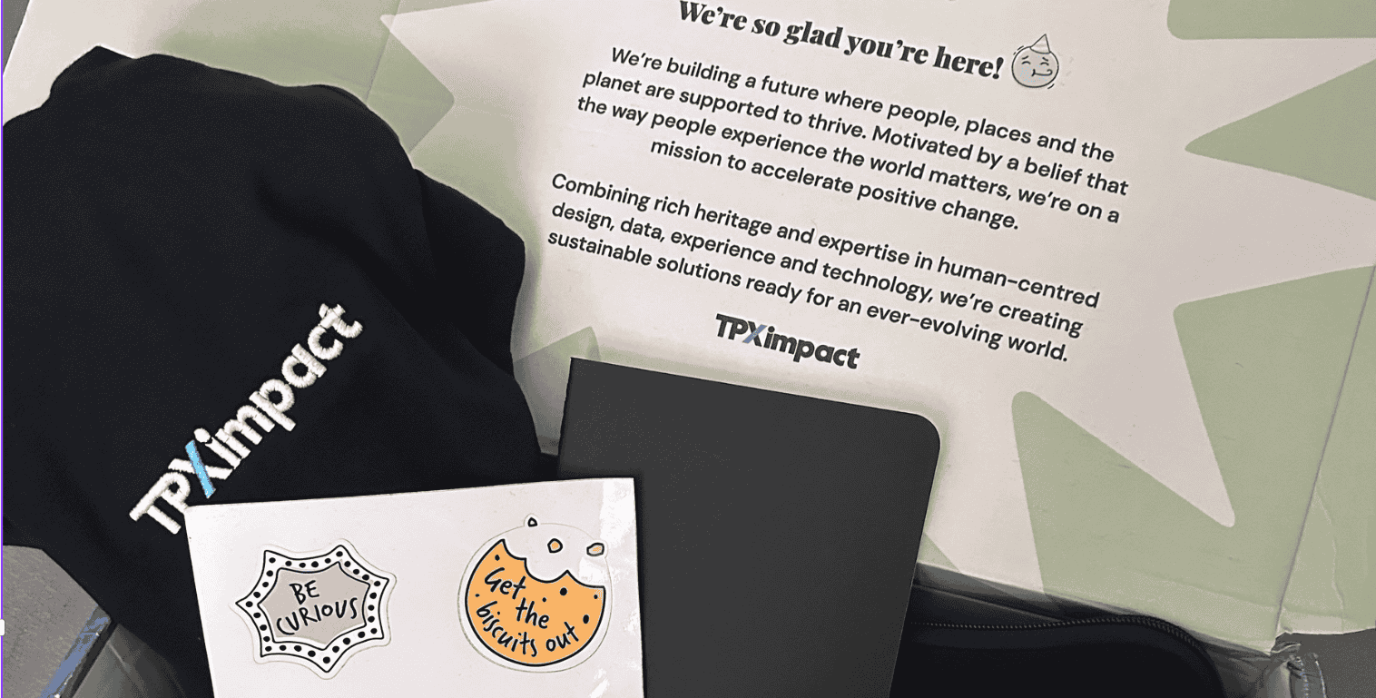 Ross's welcome box, including a TPX hat, a notebook and some stickers